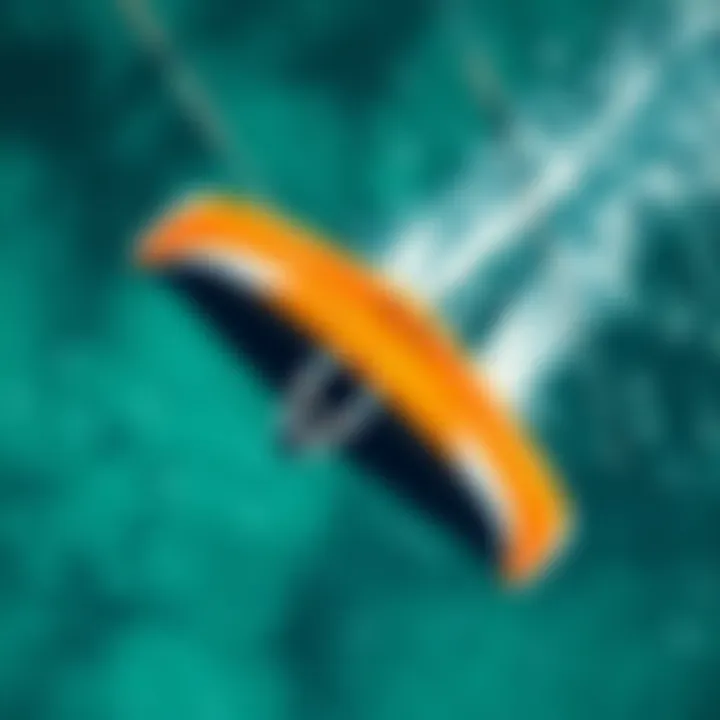 Aerial View of Cabrinha Contra Over Ocean Waters An aerial shot of the Cabrinha Contra gliding over clear ocean waters during a kiteboarding session