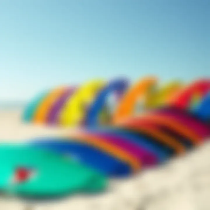 Colorful Collection of Cabrinha Contra Kites A collection of Cabrinha Contra kites in various colors displayed on a sandy beach