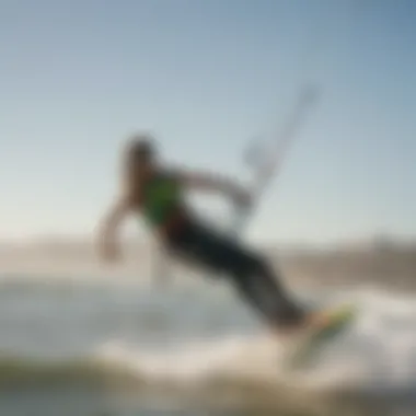 A vibrant kiteboarder riding the waves at Doheny State Beach under clear skies