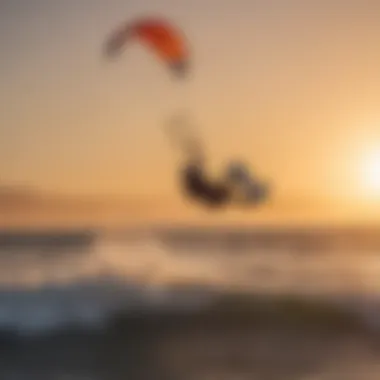 An experienced kitesurfer performing a trick against a sunset backdrop.