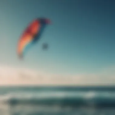 A vibrant duotone kite soaring over a sparkling ocean.