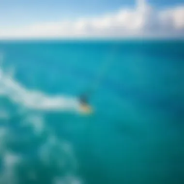 Aerial View of Kiteboarders An aerial shot of kiteboarders gliding through the ocean
