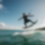 A kiteboarder gliding over the azure waters of Cabarete