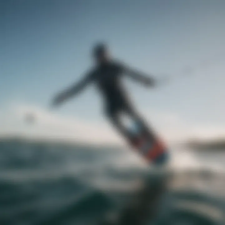 Kiteboarder in action, utilizing a carbon fiber mast on the water.