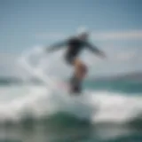 Dynamic flight of a hydrofoil kiteboard slicing through waves