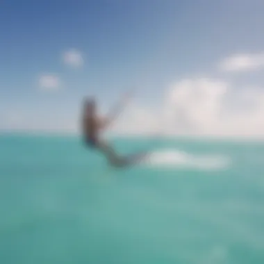 Kiteboarder gliding over turquoise waters of Grand Cayman