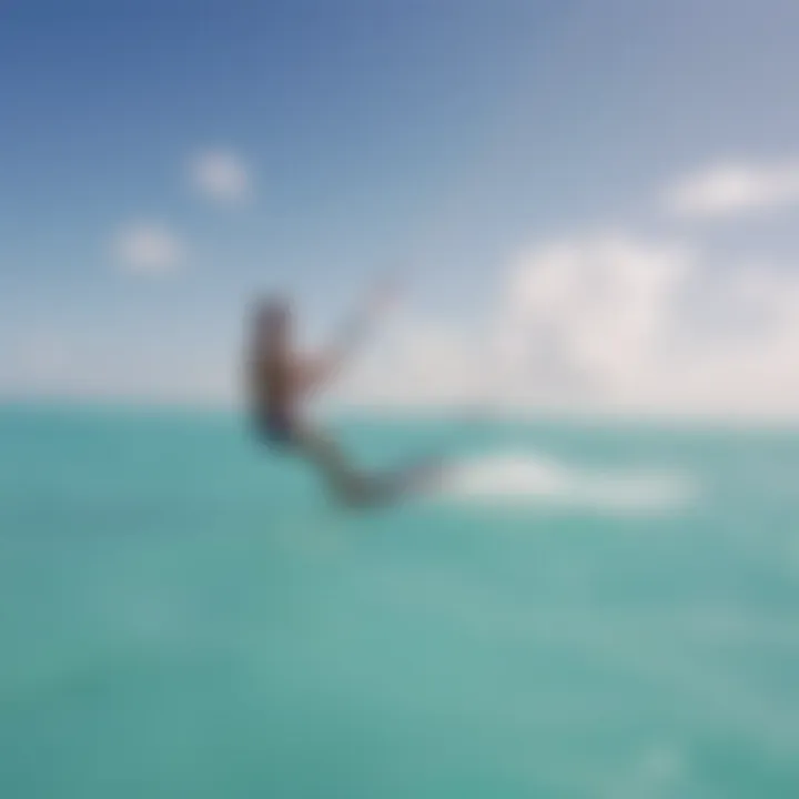 Kiteboarder gliding over turquoise waters of Grand Cayman