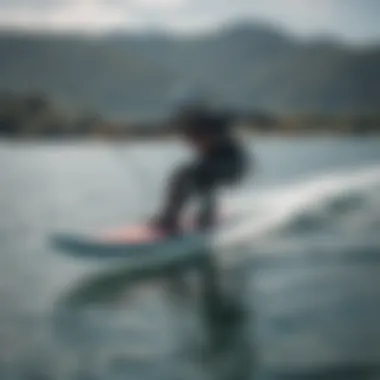 A kiteboarder gracefully gliding above the water on a hydro foil.