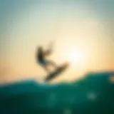 Kiteboarder soaring above the waves