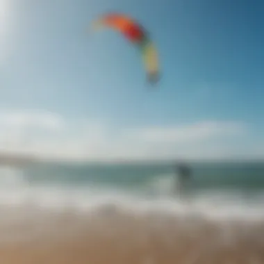 A vibrant kiteboarding scene with colorful kites soaring against a clear blue sky.