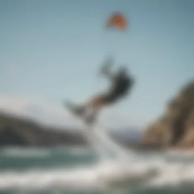 Kiteboarder catching air above a stunning shoreline