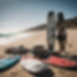 Kiteboarding gear laid out on a beach