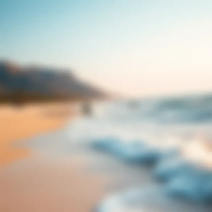 A picturesque beach destination ideal for kiteboarding, showcasing beautiful waves and clear skies.