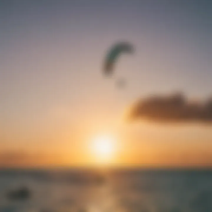 Kiteboarder performing an aerial maneuver against a sunset backdrop