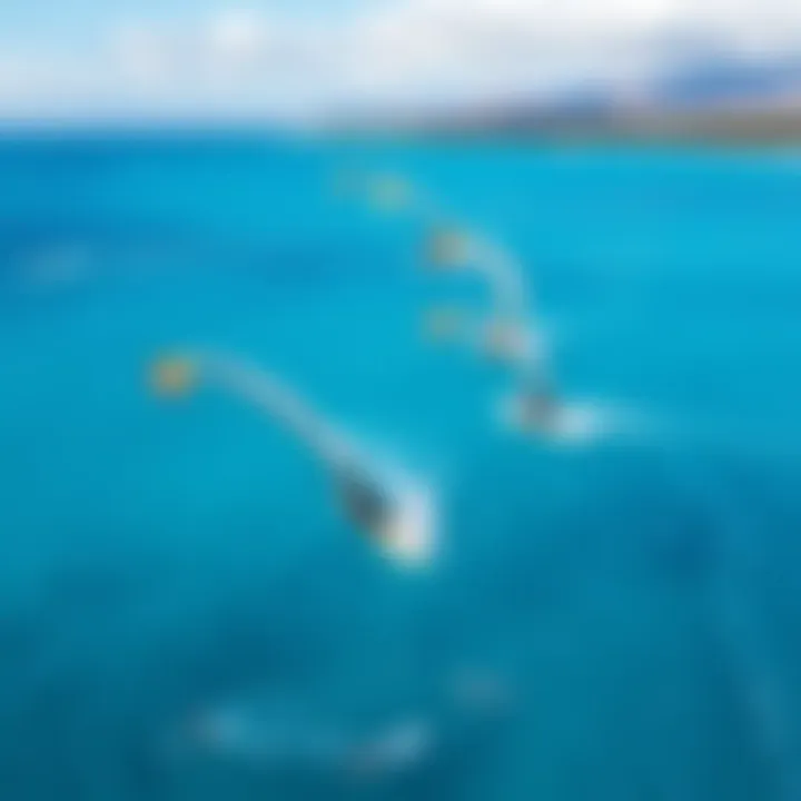 Aerial View of Kitesurfing in Maui An aerial view of kitesurfers maneuvering across the ocean