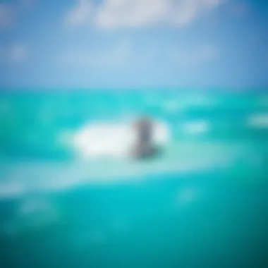 Kiteboarder navigating waves in Nassau waters