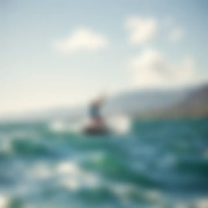 Kiteboarding Action in Maalaea Bay Kiteboarder catching the wind over the waves of Maalaea Bay.