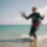 Kitesurfing instructor demonstrating techniques on the beach