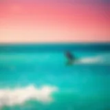 A vibrant kiteboarder gliding over the turquoise waters of Providenciales