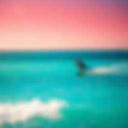 A vibrant kiteboarder gliding over the turquoise waters of Providenciales