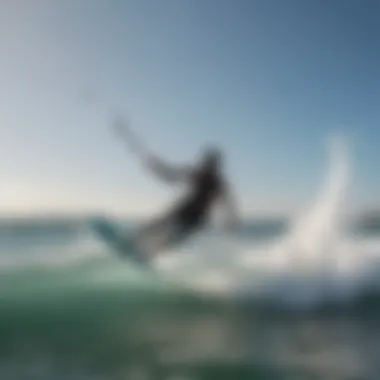 A kiteboarder using a spreader bar while riding the waves, demonstrating its effectiveness