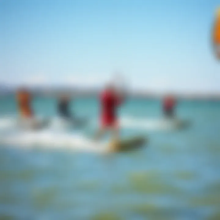Varied Riding Styles in Kiteboarding A group of kiteboarders showcasing different riding styles on water