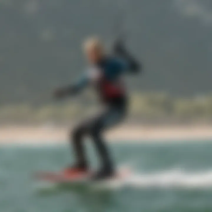 A beginner kiteboarder practicing on calm waters