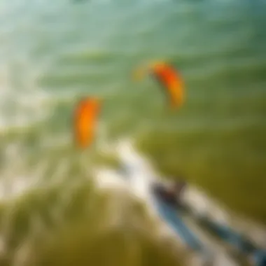 Aerial View of Kiteboarding Adventure An aerial view of kiteboarders showcasing vibrant kites against the ocean backdrop