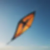 A high-performance kite soaring across a clear blue sky