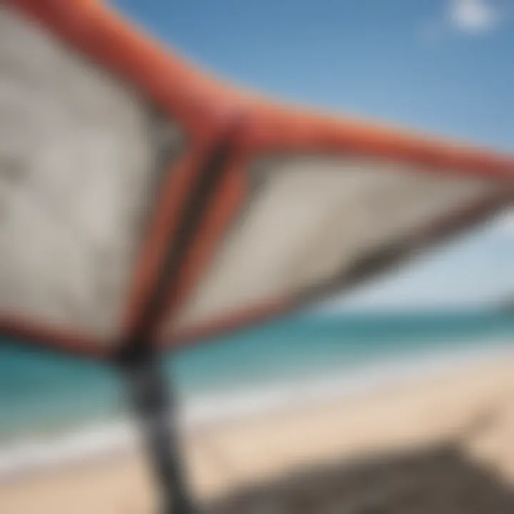 A close-up view of a used kiteboarding kite showcasing its fabric and stitching details.