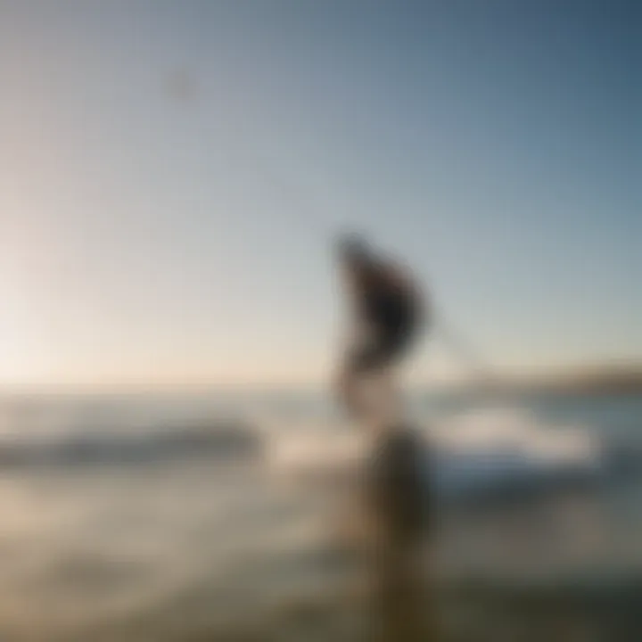 Kiteboarder using an electric pump at the beach