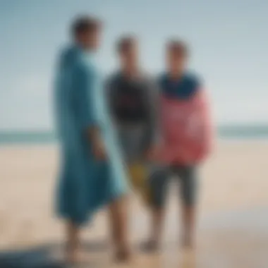 Kiteboarders Embracing Style and Function Kiteboarders using changing towel ponchos at the beach