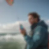 Kiteboarder checking wind conditions with the app