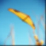 An elegant wind foil kite soaring in the blue sky