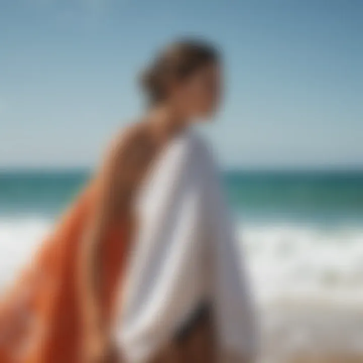 Lifestyle shot of a surfer using a changing towel