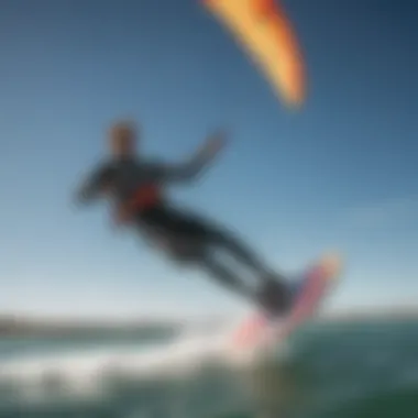 Kiteboarder in Light Winds A kiteboarder gliding effortlessly across calm waters with a vibrant kite soaring above.