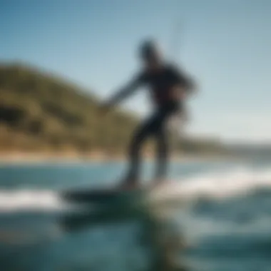 Kiteboarder gliding over water with hydrofoil