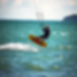 Kiteboarder soaring over tranquil waters