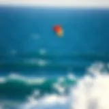 Dynamic kite soaring above the ocean waves