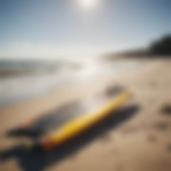 An array of kite surfing equipment laid out on the beach