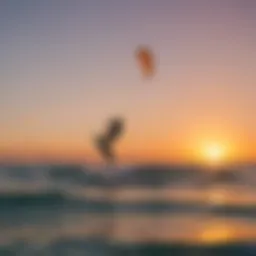 Kite surfers riding the waves at sunset in Florida