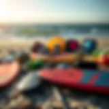 Various kite surfing equipment laid out on the beach