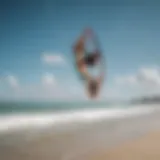 Kite surf instructor guiding a student on the beach