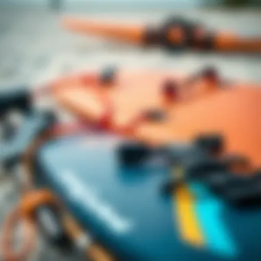 Close-up of essential kite surfing gear laid out, including a kite, harness, and board
