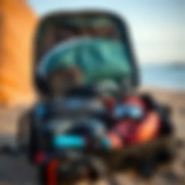 An organized packing of a kiteboard travel bag with various accessories