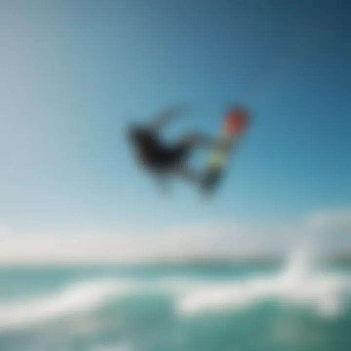 Kiteboarders in action against a backdrop of clear skies and turquoise waters