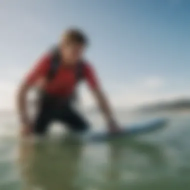 A kiteboarder adjusting their equipment before hitting the waves.