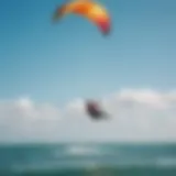 A vibrant kitesurfing scene showcasing diverse riders on colorful kites against a clear blue sky