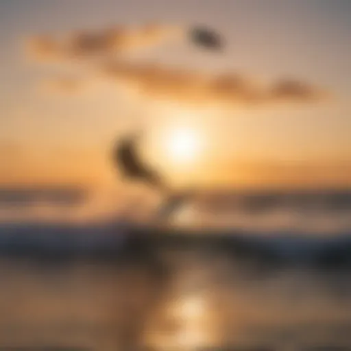 Kitesurfing at sunset over the ocean