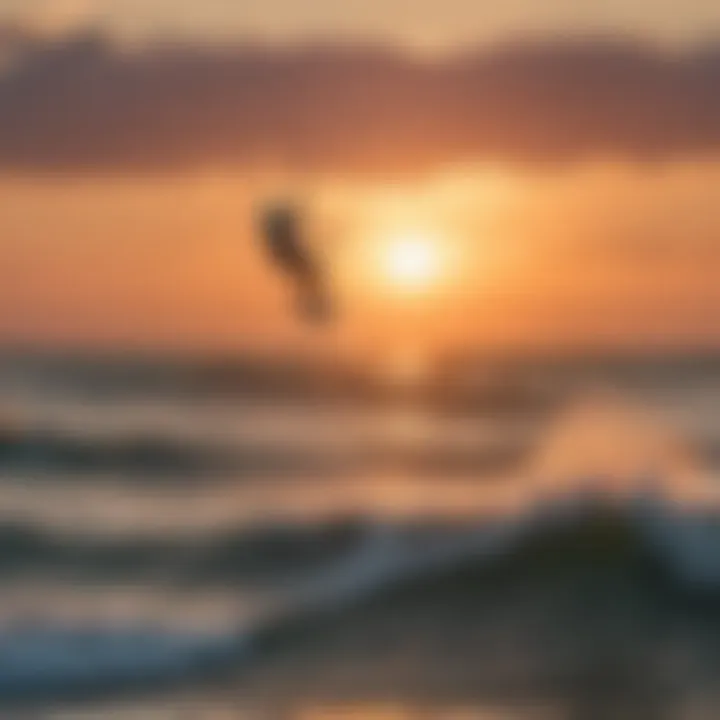 A kiteboarder riding the waves of Lake Erie during sunset